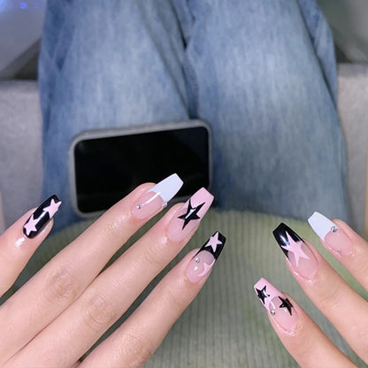 Artificial nail set with glamorous star design and sparkling accents Acalora