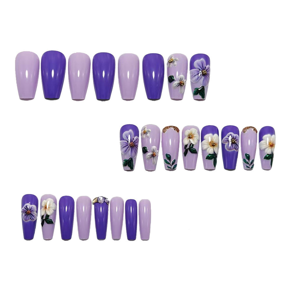 Artificial nails with floral embellishments and elegant high gloss Acalora