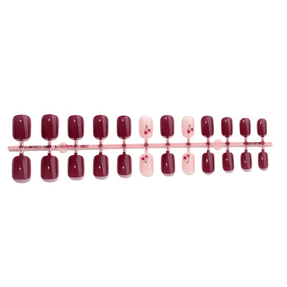 Elegant Press-On Nail Set with Cherry Accent Design Acalora