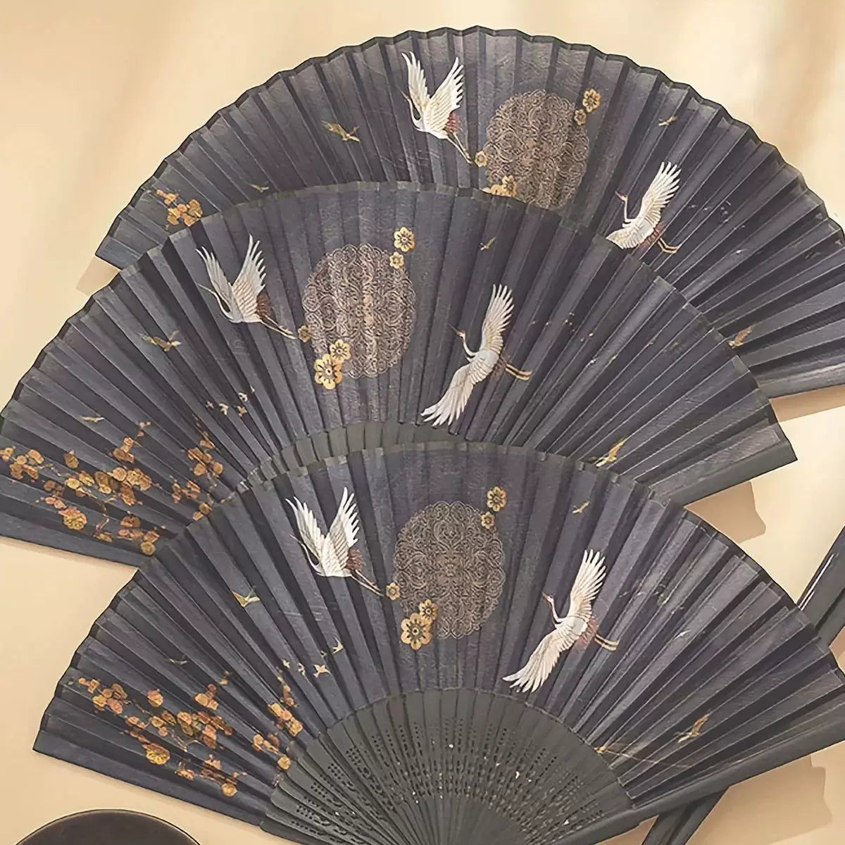 Ladies' one size hand-painted crane and plum blossom fan with carved wooden ribs and silk tassel Brehn