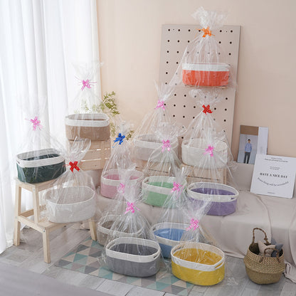 Natural storage basket with ribbons Acalora