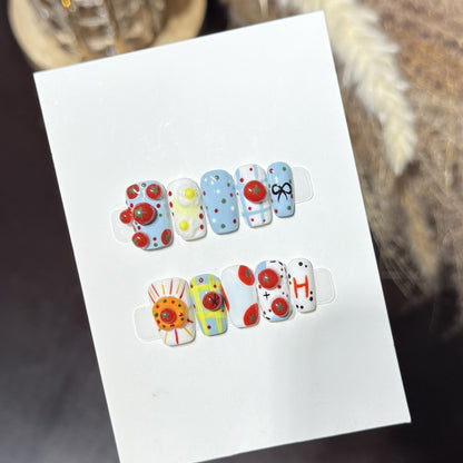 Artistic Press-On Nail Set with Playful Floral and Polka Dot Designs Acalora