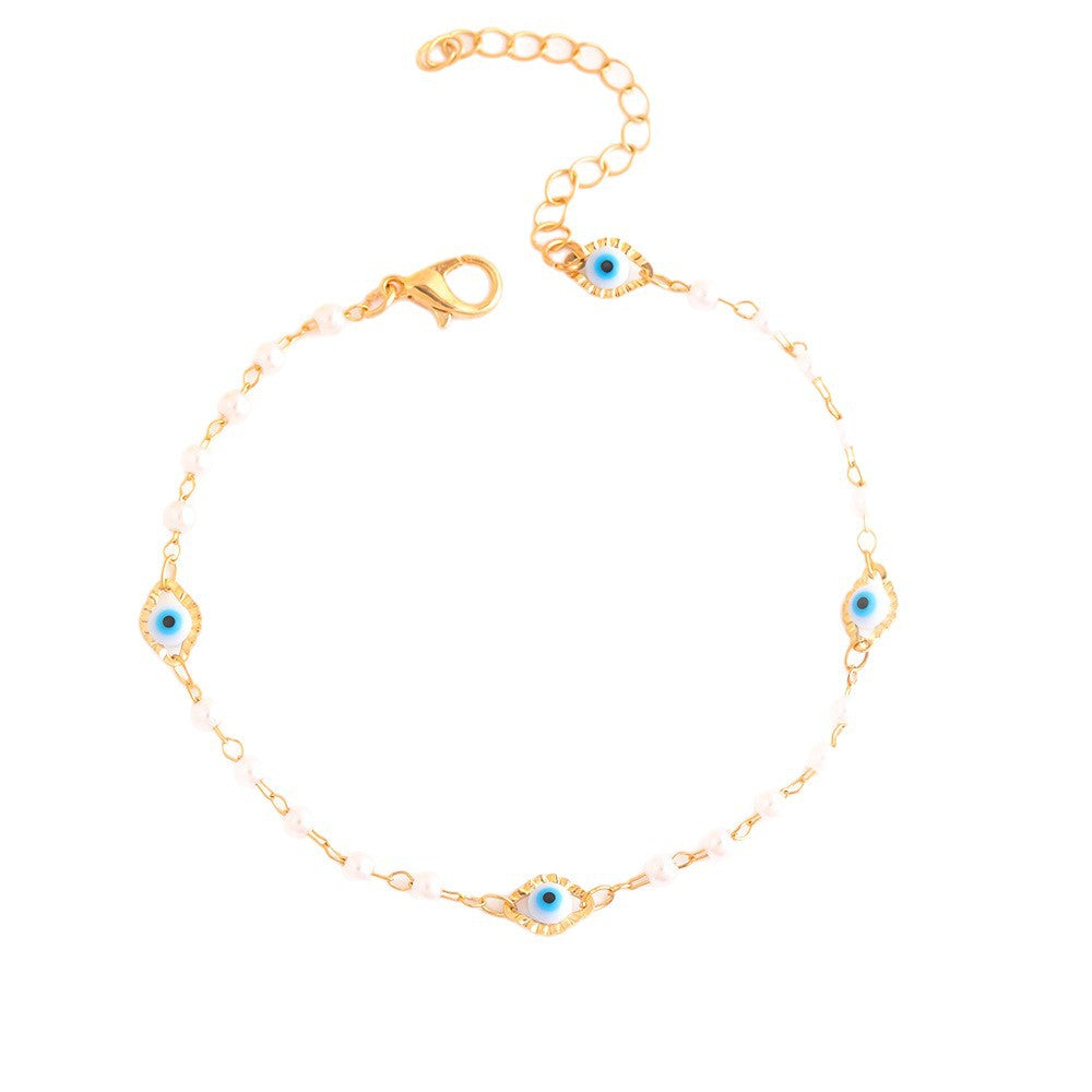 Elegant Pearl and Eye Charm Necklace Acalora