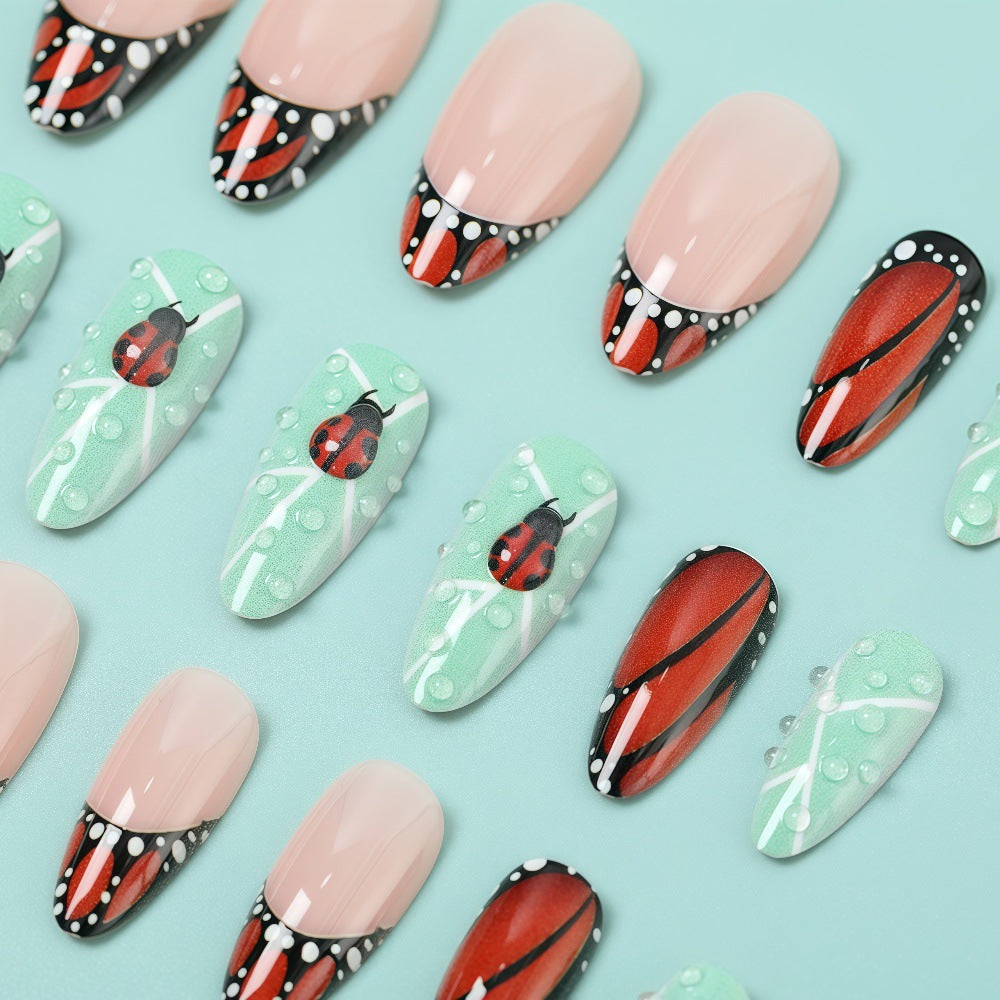 Creative nail art with elaborate butterfly and flower designs Acalora