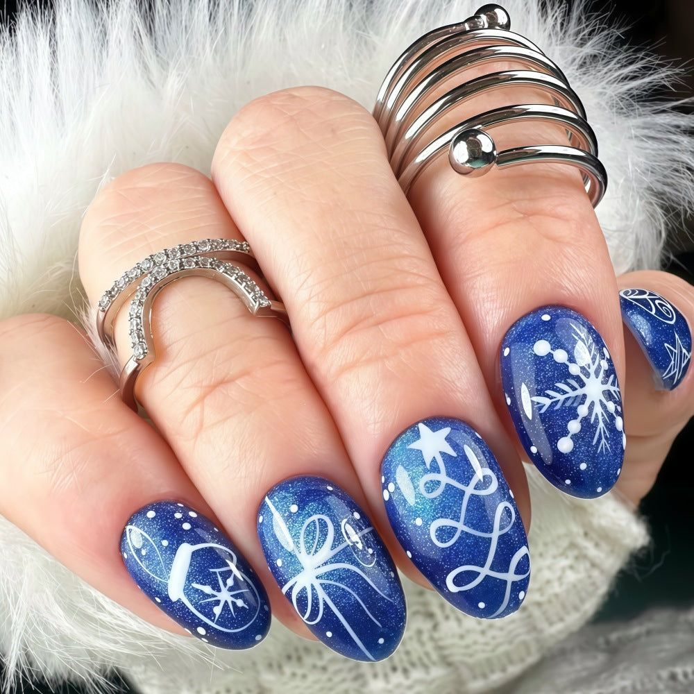 Artificial nails in festive winter design with glittering snowflakes and elegant decorations Acalora