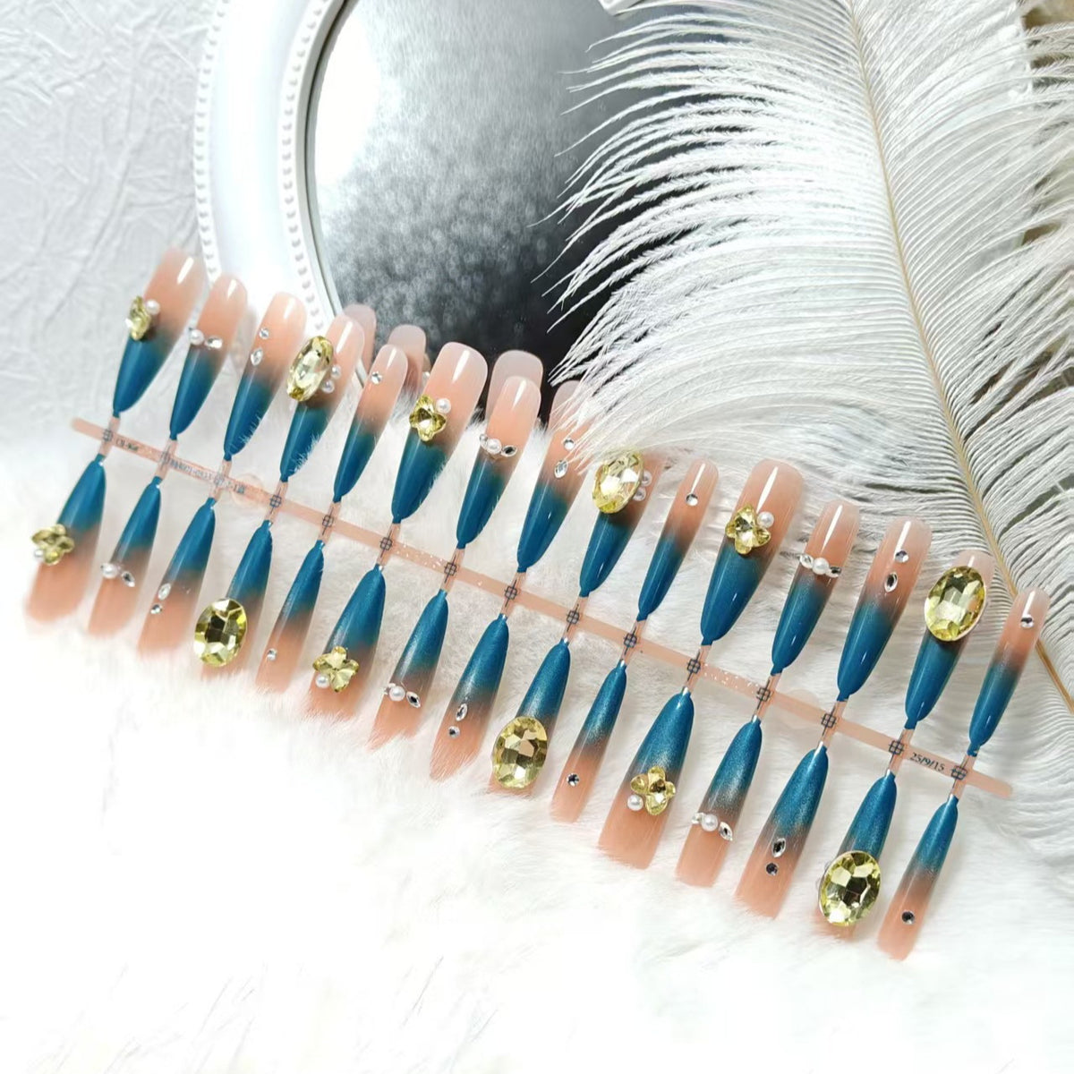 Artificial nails with glamorous stone applications Acalora