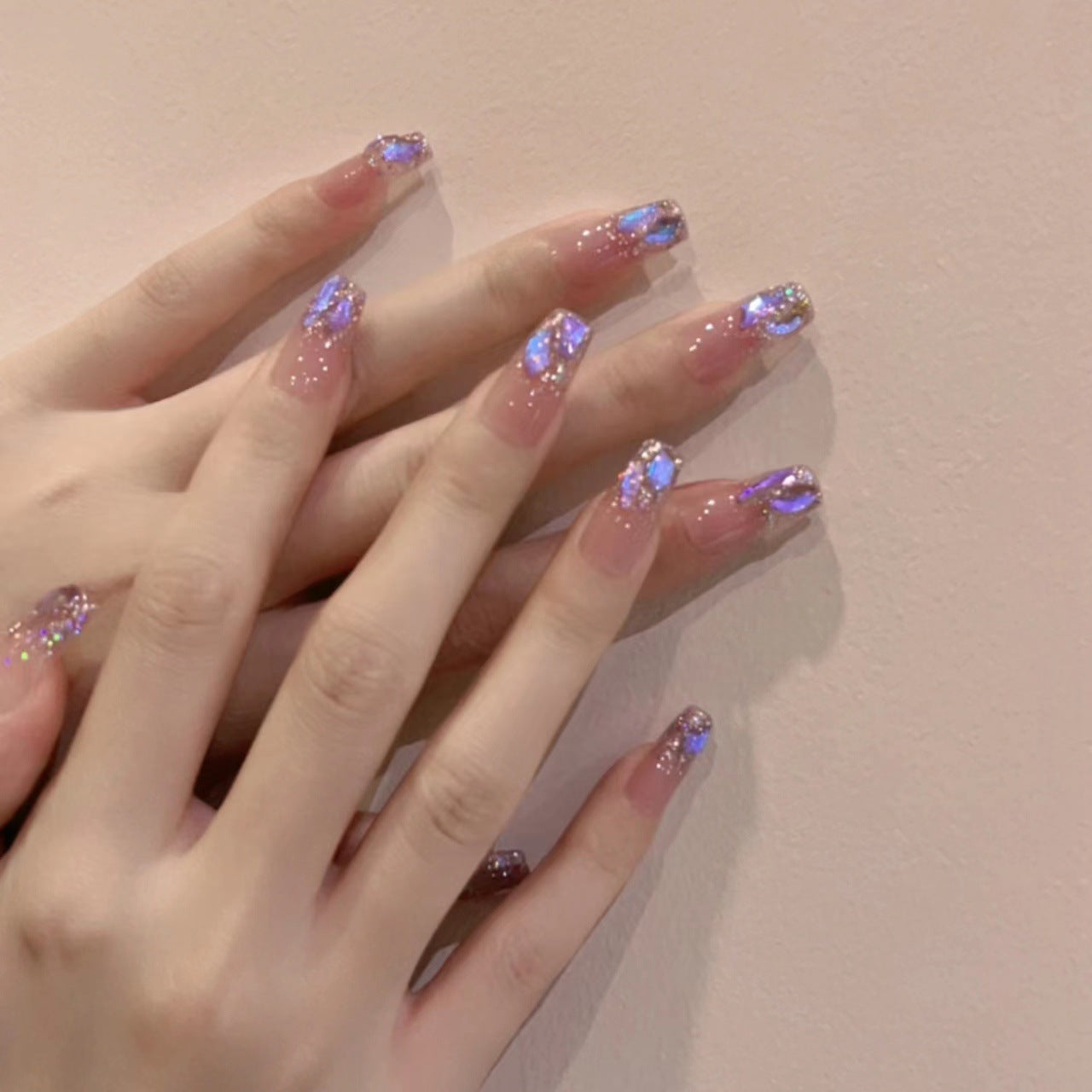 Artificial nail set with glamorous glitter accents and elegant elements Acalora