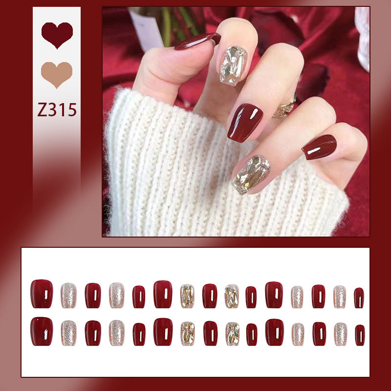 Artificial nail set with elegant glitter and metallic accents Acalora