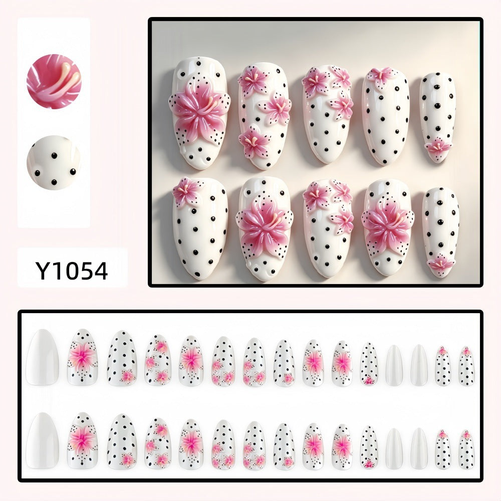 Artificial nail set with floral accents and polka dots Acalora