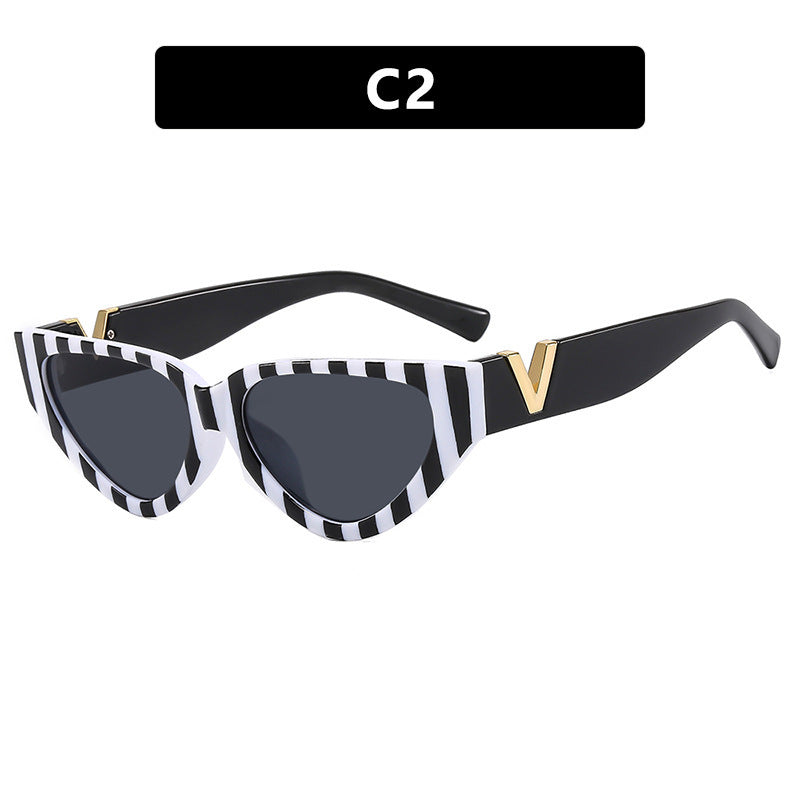 Women's Cat-Eye Sunglasses with modern stripe pattern and elegant accent Karnz