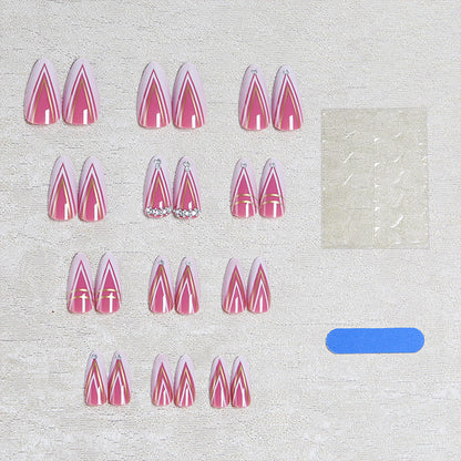 Acrylic nail set with elegant stiletto shape and luxurious embellishments Acalora