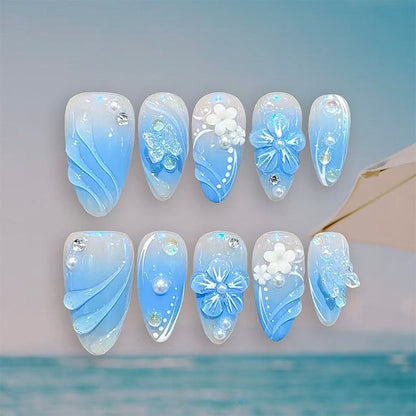 Artificial nail set with glamorous floral designs and creative glitter accents Acalora