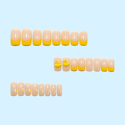 Artificial nails with playful duck motif and spring accents Acalora