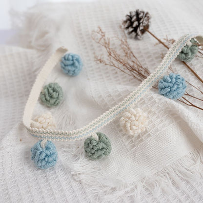 Decorative border with pompons Acalora