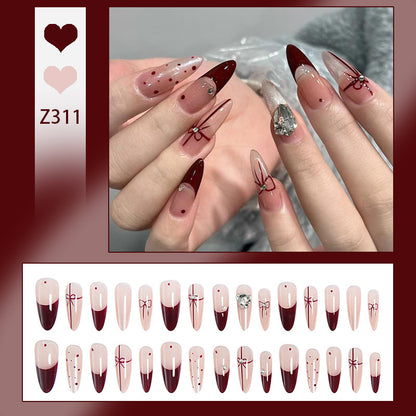 Artificial nail set with elegant bow and glitter details Acalora