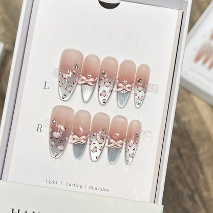 Decorative Press-On Nail Design with Bow Accents Acalora