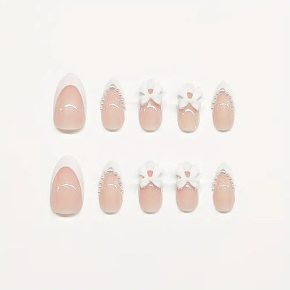 Artistic Press-On Nail Design with Bow Accents Acalora