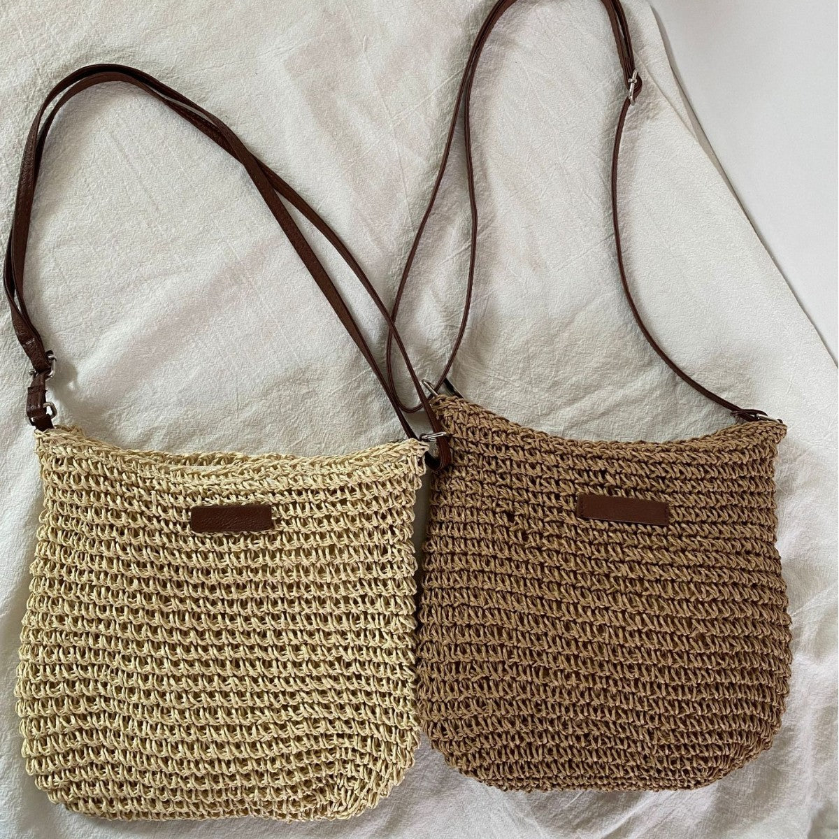 Hand-knotted shoulder bag with leather accents Skanto
