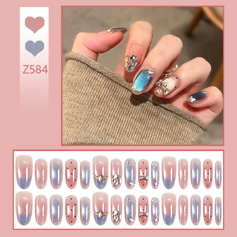 Art nails in elegant premium design with rhinestone and glitter elements Acalora