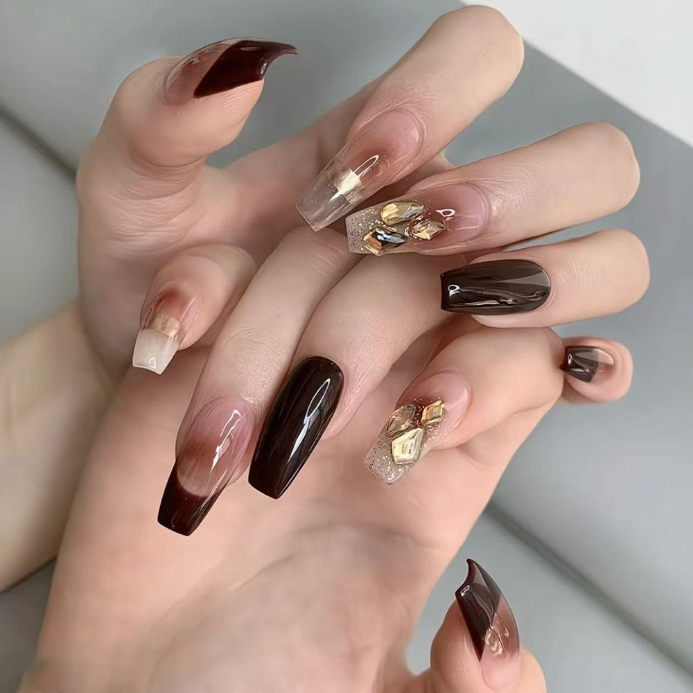 Luxurious artificial nails with glamorous decorations Acalora