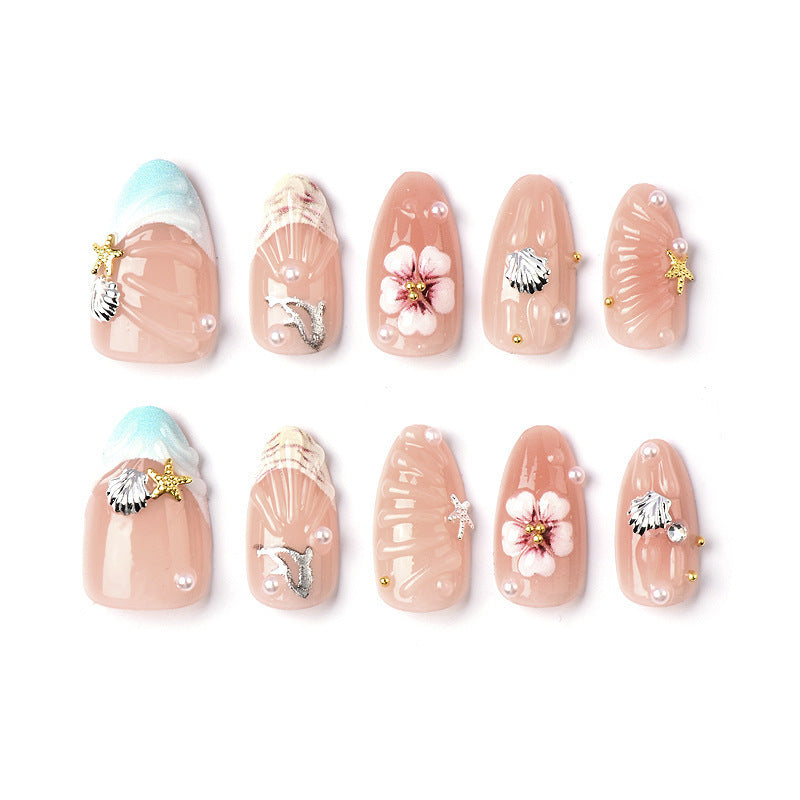 Acrylic nail set with filigree shell and flower decorations Acalora