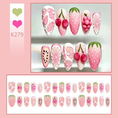 Art nail set with fruity patterns and glamorous accents Acalora
