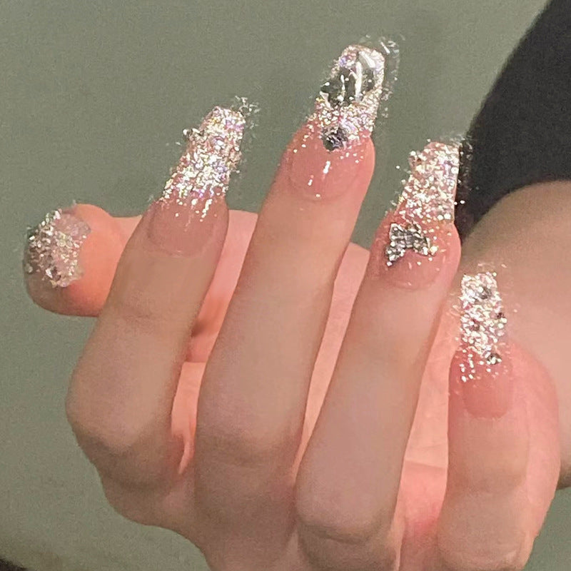 Glamorous artificial nails with sparkling rhinestones and elegant designs Acalora