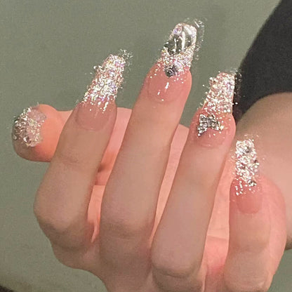 Glamorous artificial nails with sparkling rhinestones and elegant designs Acalora
