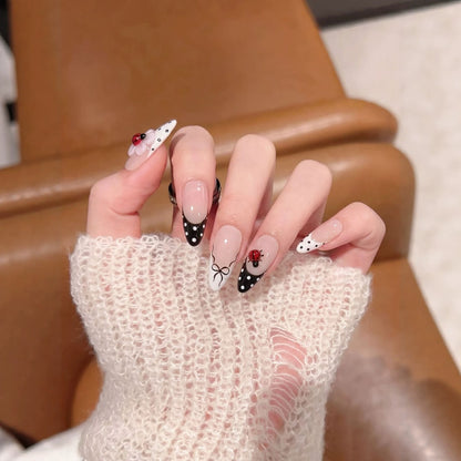 Artistic Stiletto Press-On Nail Set with Floral and Insect Designs Acalora