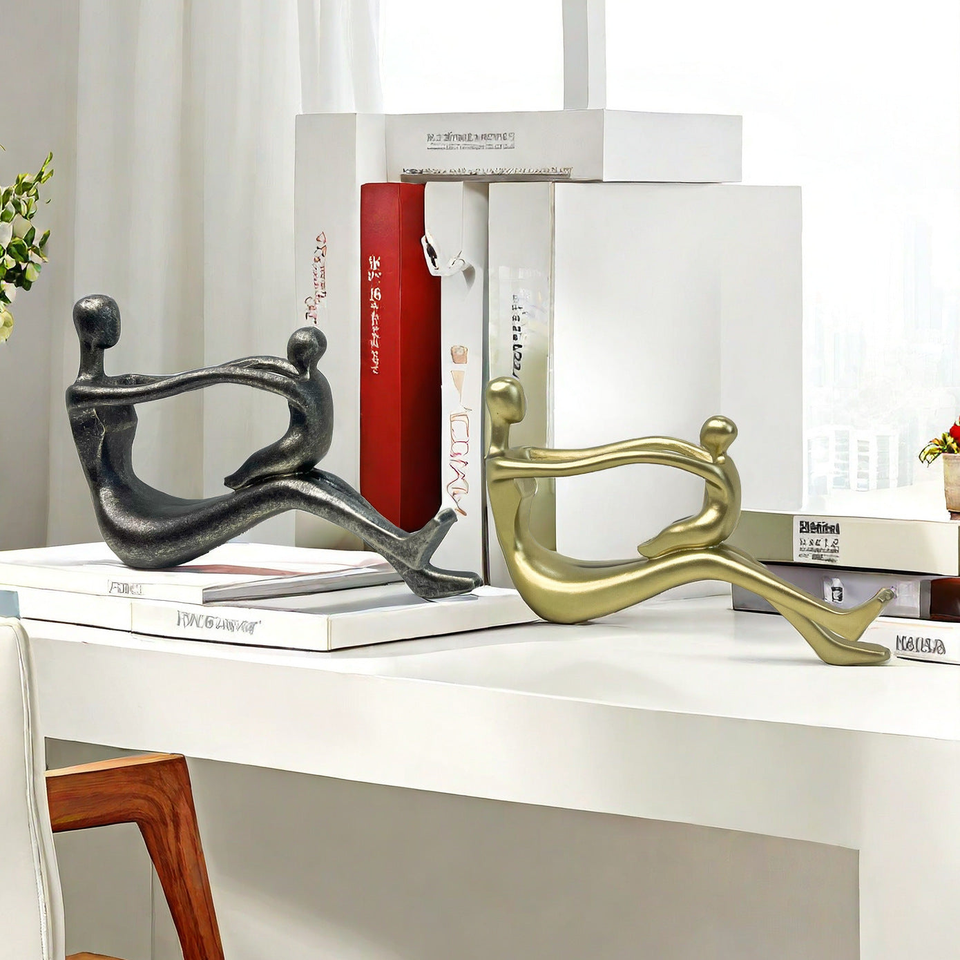 Stylish sculpture with intertwined figures Acalora
