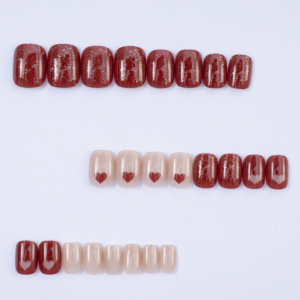 Art nail set with heart designs and glitter Acalora