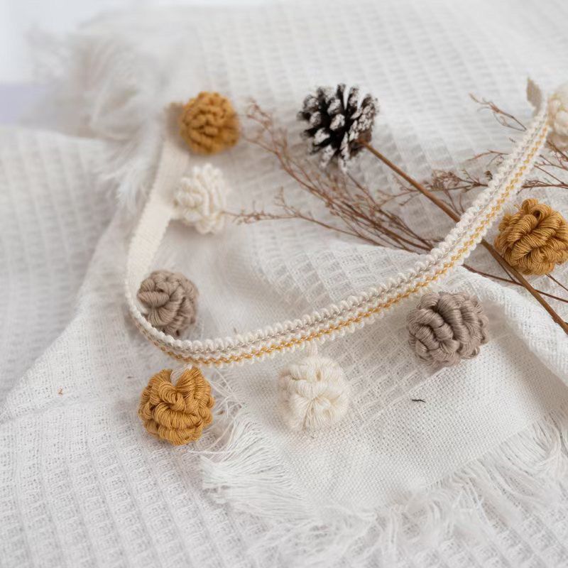Decorative border with pompons Acalora