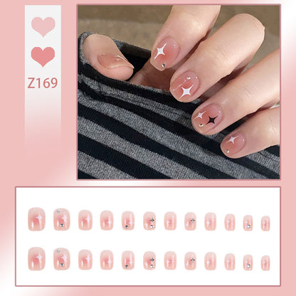 Acrylic nail set with sparkling star decorations and elegant accents Acalora