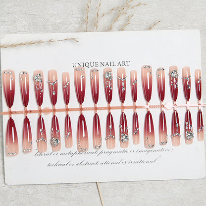 Artificial nails with elegant glitter and jewelry accents Acalora