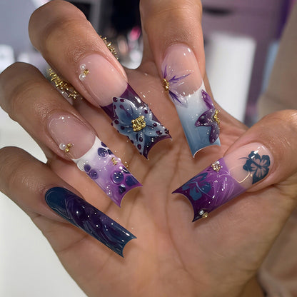 Artistic Long Nail Design with Floral Accents Acalora