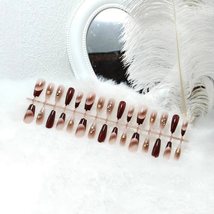 Artificial nails with elegant color gradients and jewelry details Acalora