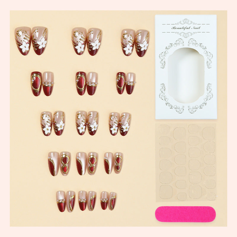 Artistic Press-On Nail Set with Floral and Metallic Accents Acalora