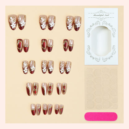 Artistic Press-On Nail Set with Floral and Metallic Accents Acalora