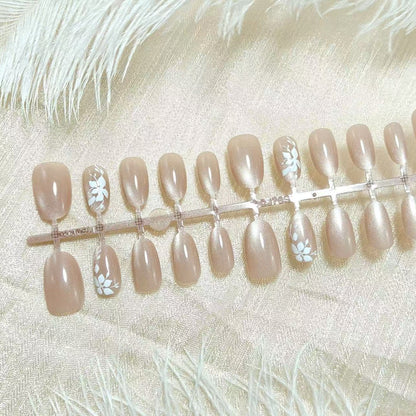 Artificial nails with cute Christmas design and glamorous accents Acalora