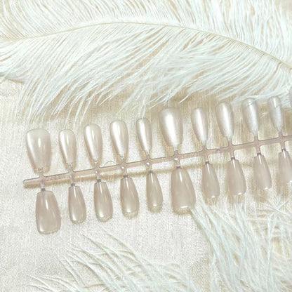 Artificial nails in elegant nude glitter design Acalora