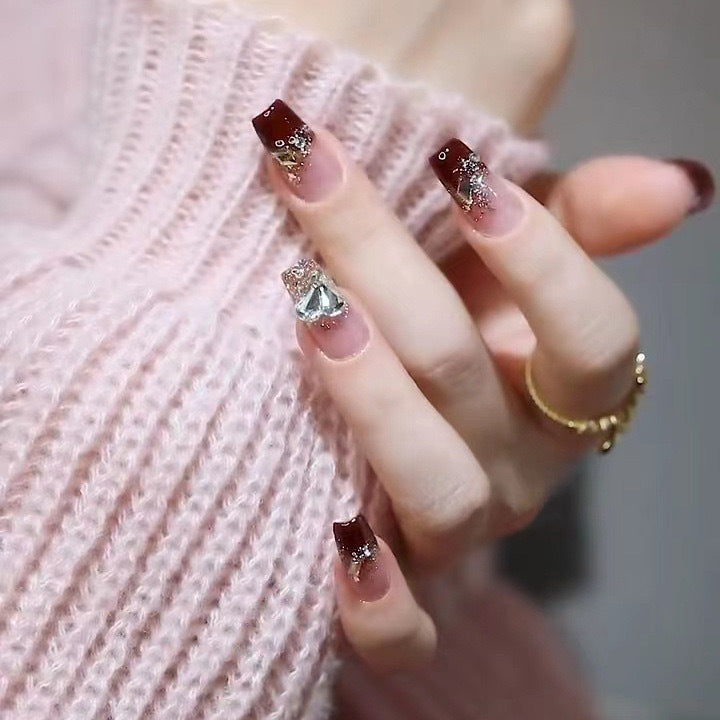 Artificials nails with glitter embellishments and elegant accents Acalora