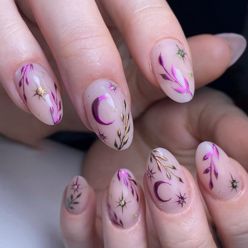 Artificial nails in a playful flower design with glittering accents Acalora