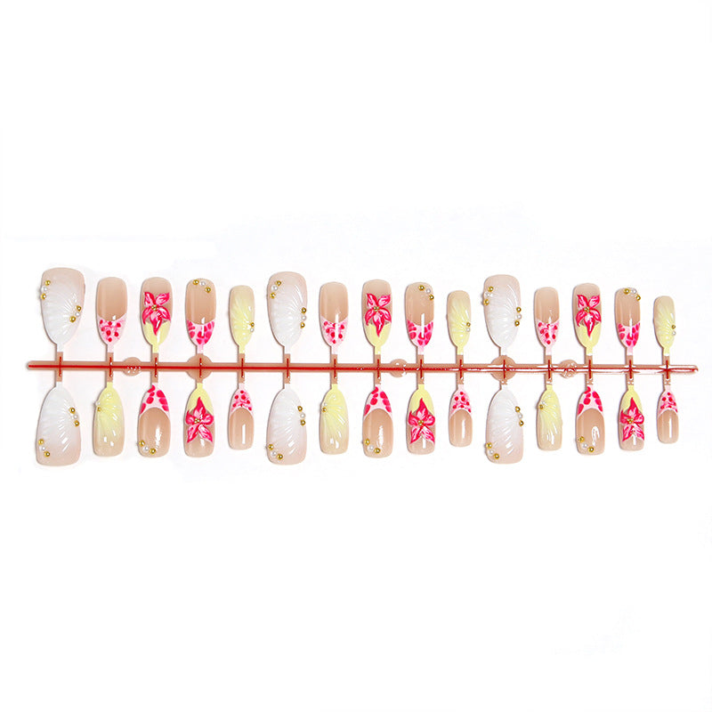 Artificial nail set with floral motifs and elegant embellishments Acalora