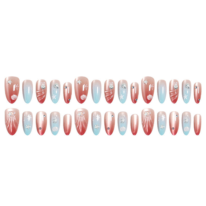 Artificial nails with sparkling rhinestone embellishments and maritime design Acalora