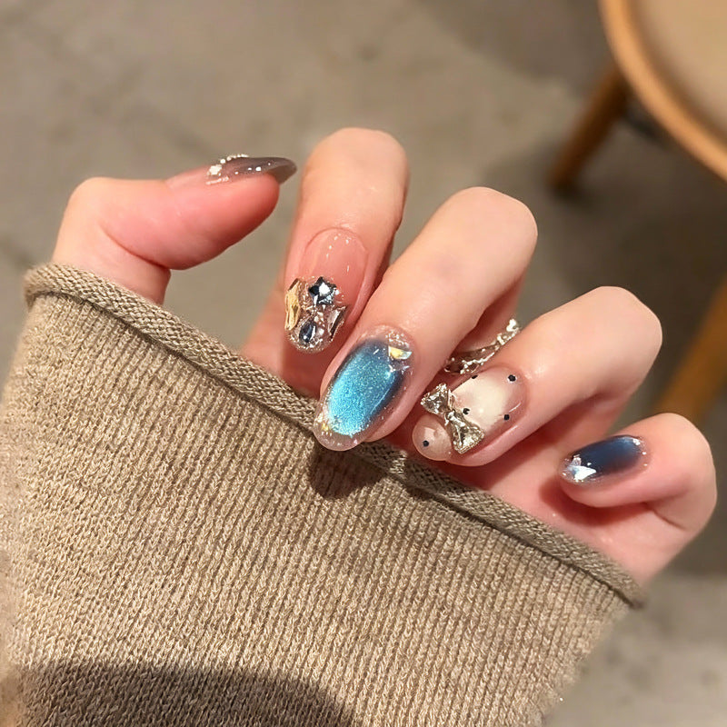 Art nails in elegant premium design with rhinestone and glitter elements Acalora