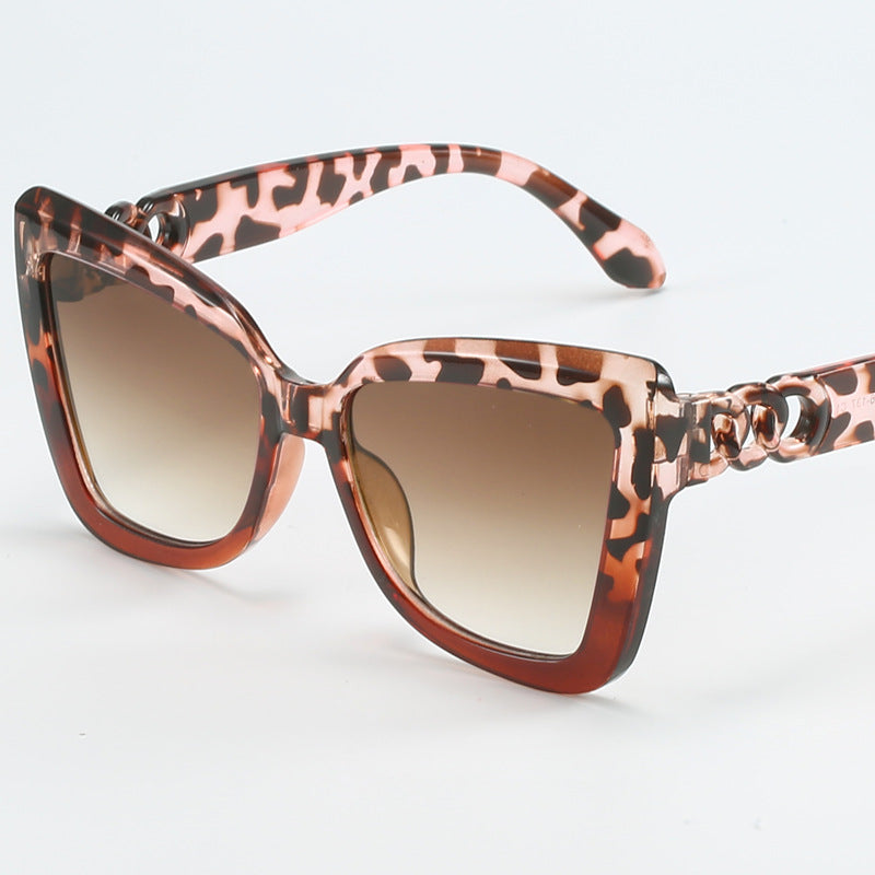 Women's modern Cat-Eye sunglasses with clear frame and UV protection Karnz