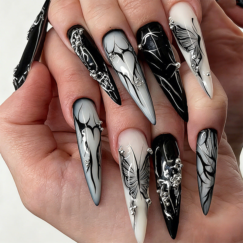 Artificial nail set with elegant geometric designs and creative metallic accents Acalora