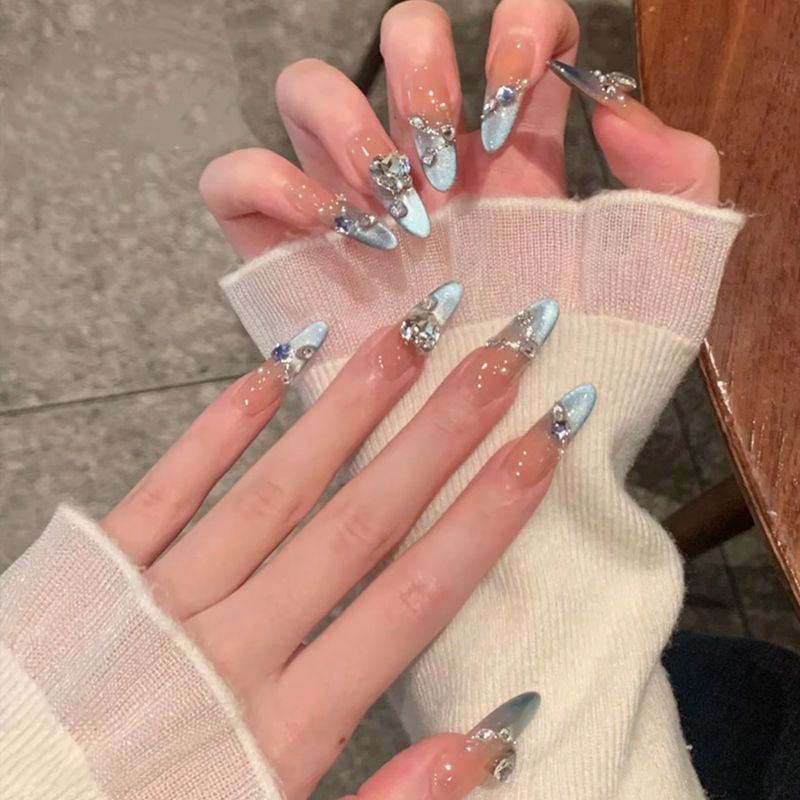 Glamorous artificial nail tips with elegant decorations Acalora
