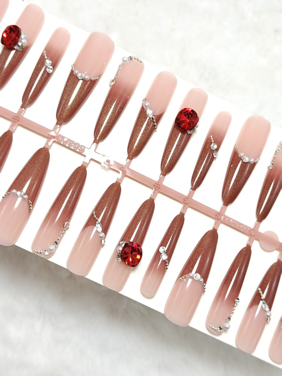 Artificial nails with luxurious 3D decorations and glamorous accents Acalora