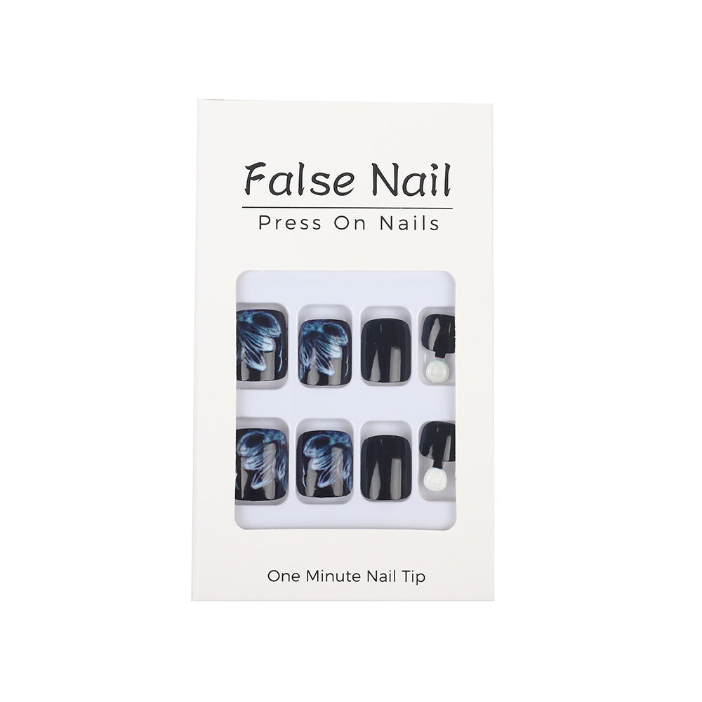 Glamorous artificial nails with floral accents Acalora
